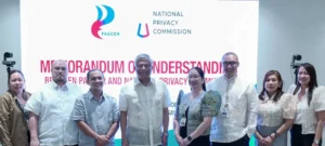 PAGCOR and National Privacy Commission officials signing data privacy partnership agreement in Pasay City